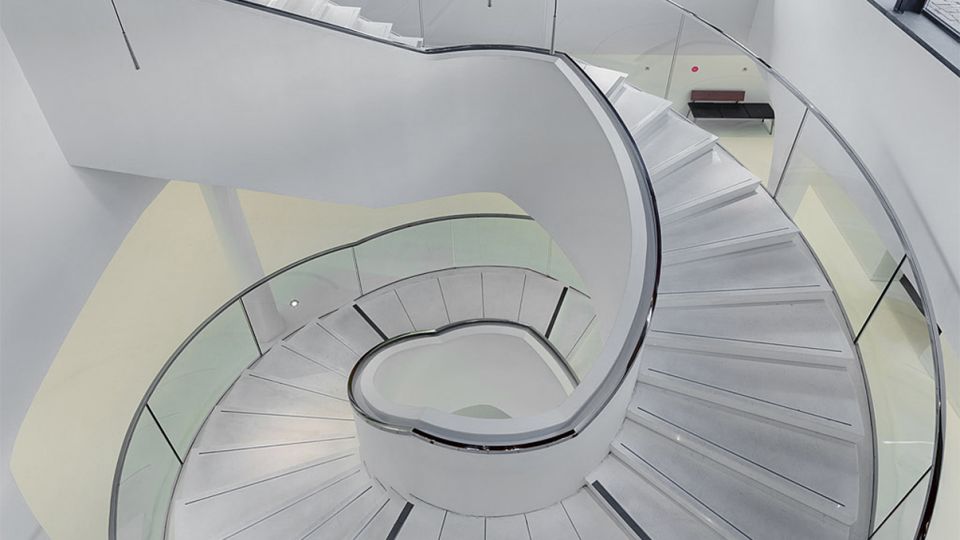 Spiral staircase with glass railing